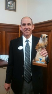 Rick Pearce holds Baldwin.