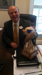 Baldwin sits on Torre Meringolo's desk.