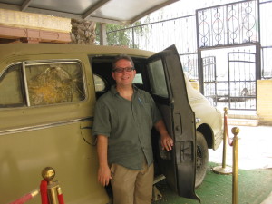 Prof. Al-Tikriti stands in front of armored car of President 'Abd al-Karim Qassim (d. 1963)