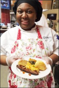 Supervisor Kadasha Jennings was proud to show off UMW's prize-winning plate.