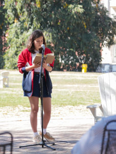 UMW sophomore Katia Savelyeva reads a chapter from emily m. danforth’s ‘The Miseducation of Cameron Post’ at UMW’s Banned Books Week Read Out on Wednesday. Photo by Matthew Binamira Sanders.