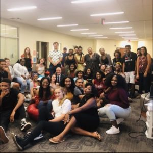 UMW President Troy Paino (middle, suit and tie) poses with members of UMW’s new chapter of the NAACP. The chapter was chartered last May.