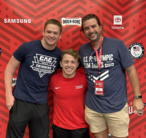 Joey Peppersack '21, UMW Assistant Swim Coach Zach Shattuck and UMW Swim Coach Justin Anderson '10