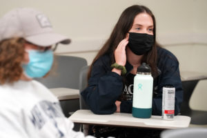 “We don’t need most of the fast-thinking system processes that were used thousands of years ago to survive,” said first-year student Bridget Zagrobelny (right), who learned from the PBS episode that autopilot thinking in modern life often results in mistakes and poor decisions. Photo by Suzanne Carr Rossi.