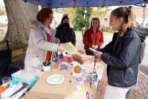 Junior philosophy major and Campus Vote Project Fellow Kate McDaid (front, left) works with UMW Votes to help freshman Emma Goehner prepare to head to the polls. Seventy-nine percent of UMW students (more than the national average) cast their ballots in the last election. Photo by Suzanne Carr Rossi.