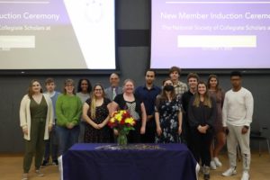 From left to right Elizabeth Glenn, Tanner Nalley, Ainsley Logar, Yokabit Ayele, Olivia Mallory, Ray Tuttle, Elizabeth Golden, Ian Jenkins, Samantha Greer, Nick Bindon, Christopher Anderson, Avery Nelson, Madison DeWitt, Yonatan Asfaw pose for photos at the ceremony.