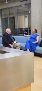 UMW Associate Professor of Biological Sciences April Wynn talks with Richard Groover of George Mason University during the annual meeting of the Virginia Academy of Science, held at Mary Washington.