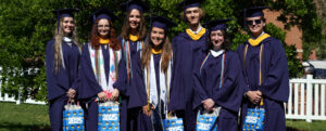 UMW Graduates (from L) Kelsey Payne, Maria Werner, Bonnie Butler, Jessica Oberlies, Thomas Held, Kathleen Conner and Austin Moore earned the Colgate W. Darden Jr. Award for Academic Achievement for completing their degrees with the highest grade-point average in the undergraduate program. Photo by Suzanne Carr Rossi.